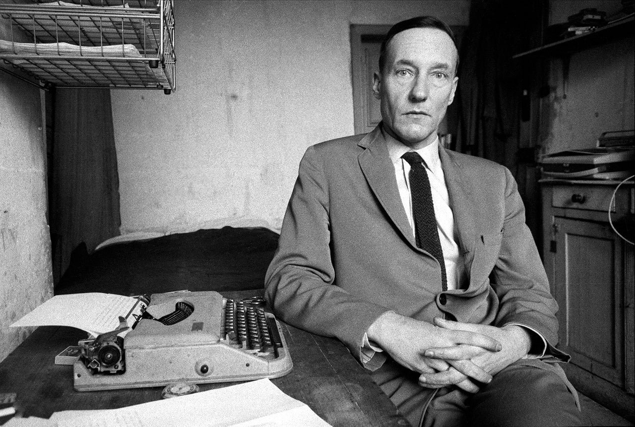 William Burroughs with Manuscript of "The Soft Machine", Paris, 1960